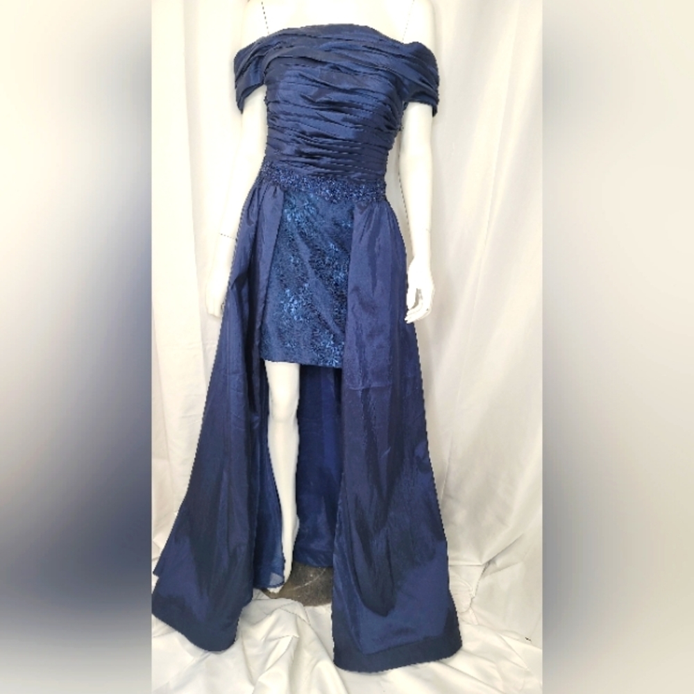 Hand Tailored Gown.